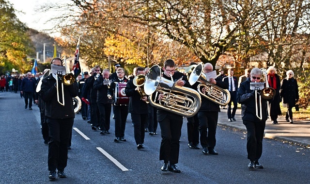 Whitworth Remembrance procession led by Whitworth’s Vale and Healey Brass Band