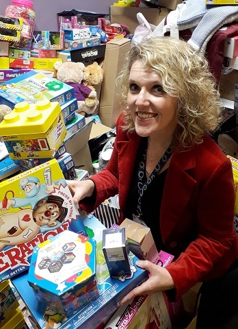 Giving Back Charity Member Helen Walton helping sort the gifts last year