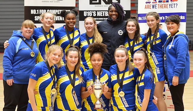 Emma and her Tameside teammates with the trophy