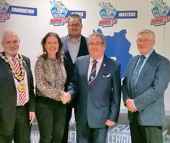 Chairman of Rochdale Hornets, Peter Rush (second from right) welcomes Rebecca Argyle director of Toronto Wolves, Cllr Blundell, Mayor Mohammed Zaman and Tony Lloyd MP to Hornets