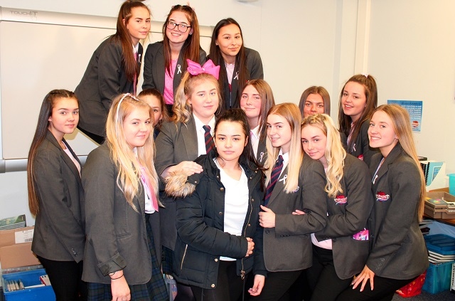 Millie O’Shea (centre) and her friends who raised money at Whitworth Community High School