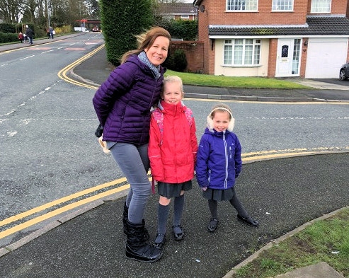 Sally Hall, with daughters Lola, 7, and Elsa 4, who go to Caldershaw Primary School, in Norden