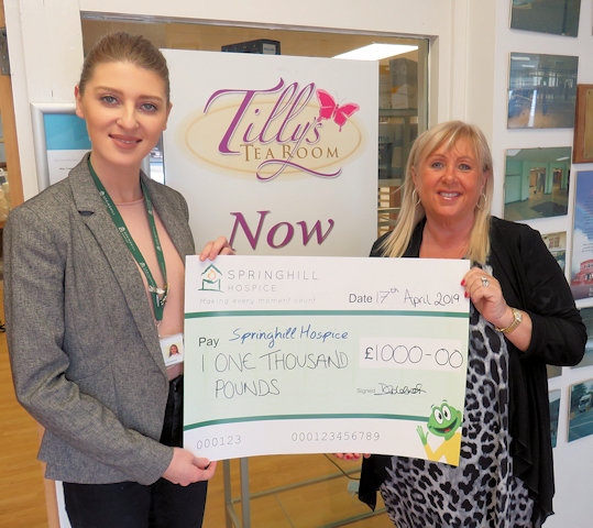 Sophie Ansley, Corporate and Partnership Fundraiser for Springhil Hospice with Debbie Goldrick presenting the cheque