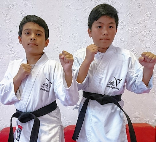 Sahail Ali and Gabby Pasay gain their Karate Black Belts