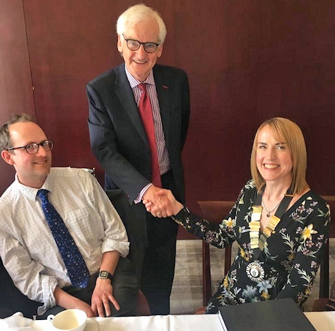 Zoe being congratulated by Joe Egan, former President of the Law Society of England and Wales (2017 to 2018)