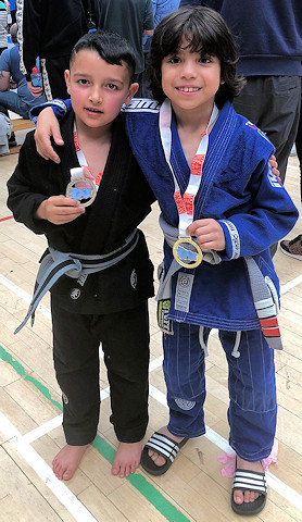 Andrew (right) with the silver medal victor