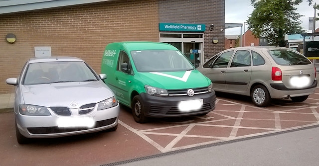 Pharmacy delivery van at Wellfield Health Centre on Oldham Road parked in a disabled parking spot 