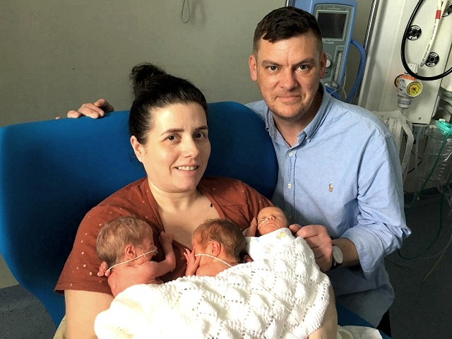 Mum and dad, Elise Mitchell and Paul Taylor, with the triplets Lucy, Lily and Arthur