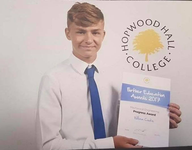 William Cooke with his further education award
