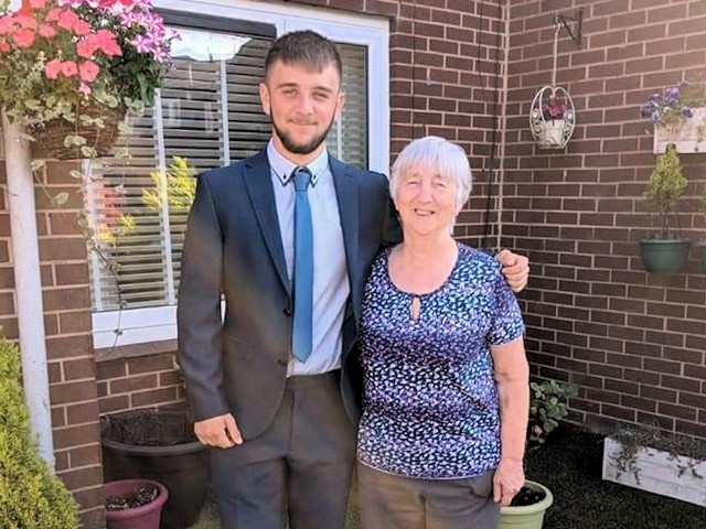 Linda Phillips with grandson Brody before his school prom in 2018