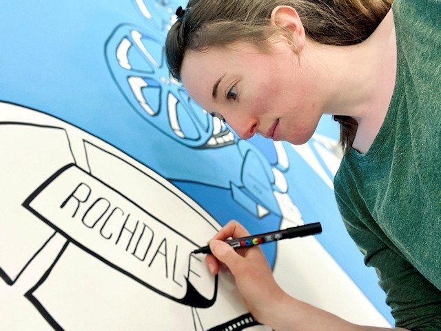 Local artist, Doodlher, has produced a 35-metre-long mural inside Rochdale's Reel Cinema