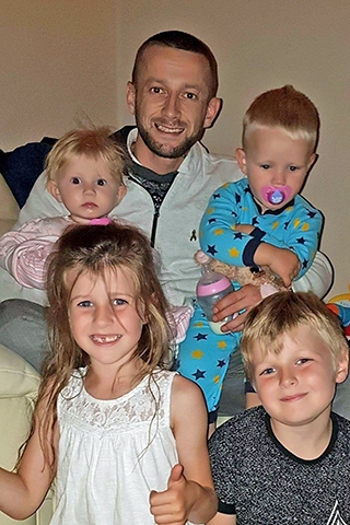 Anthony ‘Enzo’ Evanz with his four children
