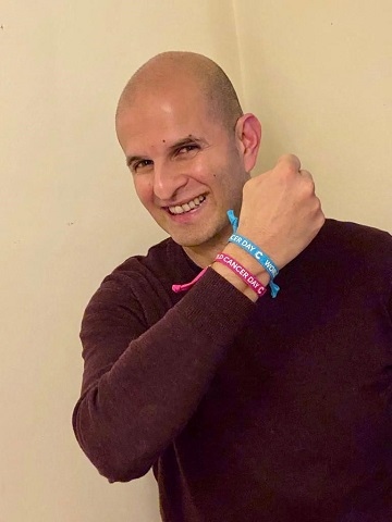 Dr Ali Raoof wearing Unity bands