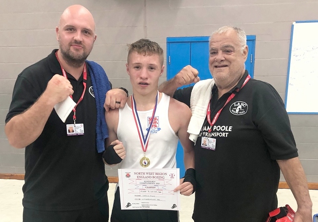 Leevan Fong Junior, of Littleborough ABC, with coach Mark Oldham (left) and Jeff Leach (right)