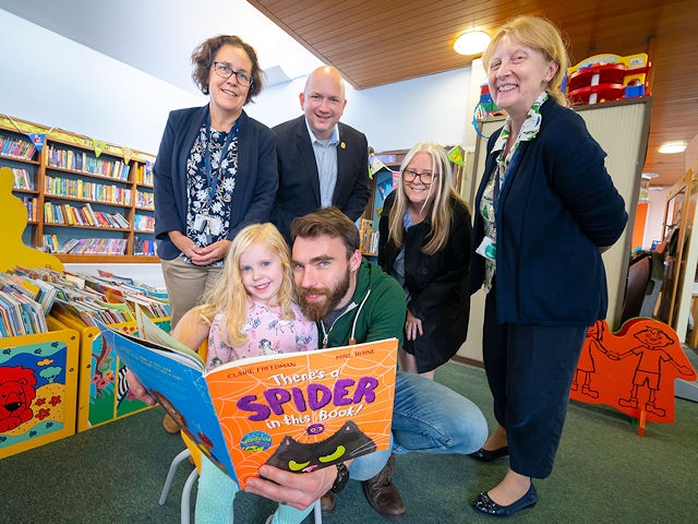 Back row: Michelle Krauza, library service; Councillor Phil Massey, Balderstone and Kirkholt ward councillor; Councillor Sue Smith, cabinet member for libraries; Joanne Eaves, library service. Front row: Local residents, Maya Laing, Mike Laing.