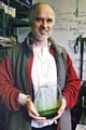 Brian Blanthorn holding a piece of his glass