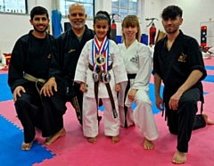 Maryam Nurani with her coaches at the Dojo Karate Centre, Rochdale