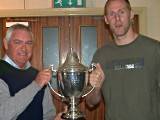 League Vice Chairman Trevor Jones presents D & P Captain, Michael Barker, with the Chris Shyne Trophy