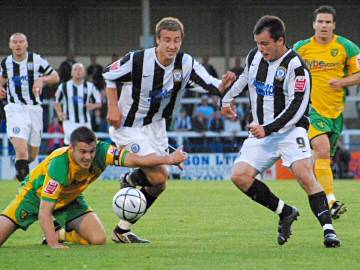 Murray and Chris Dagnall break clear of the Norwich defence