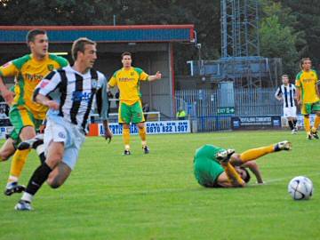 Glenn Murray capitalises on Ian Murray's poor back pass to give Dale the lead