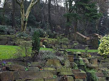 The landscaped gardens by the side of the fountain