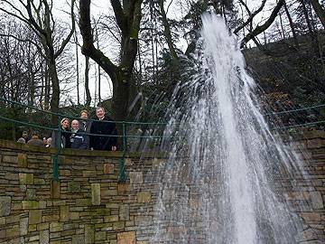 The Packer Spout fountain in full flow, watched by Councillors Wera Hobhouse, Keith Swift, Irene Davidson and Alan Taylor