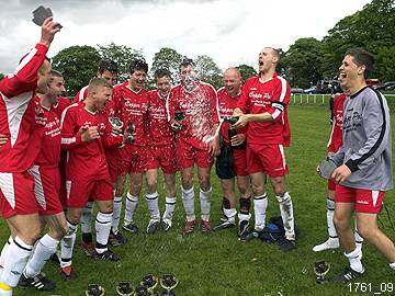 Copperpot players celebrating a recent cup victory.