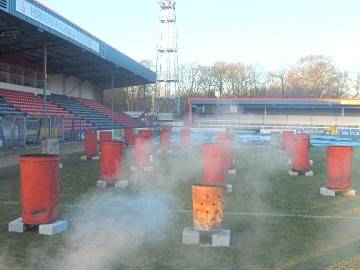 Burning braziers at Spotland Stadium