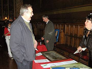 David Acton views the painting of Sir Cyril Smith