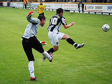 Adam Le Fondre charges down Richard Whiteside's kick