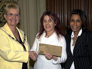 Winner of the best stand Tracie Powers (Urban Gallery) Deputy Mayor of Rochdale Councillor Jean Hornby and Nighat Awan OBE  