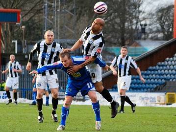 Lee Thorpe rises to win a header