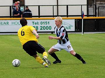 David Perkins looks to take on Southport's Dave Prout