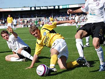 Tom Kennedy goes to ground in the Hereford box