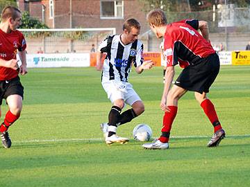 Higginbotham looks to take on the Droylsden defence once more