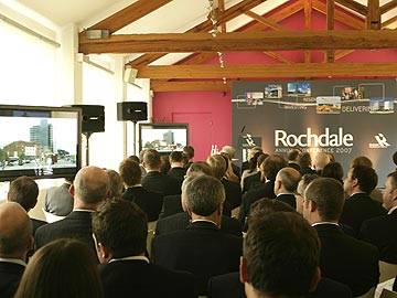 The main part of the first part of the conference was dedicated to presentations, here the conference are being shown details of the town centre development.