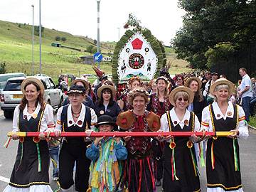 The Rushcart is paraded from the Canal Wharf to Littleborough town square