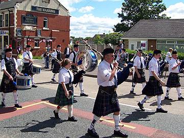 The Oldham Pipe brand strike up a tune on their bagpipes