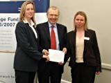 Groundwork's Claire Igoe, Senior Advisor, and Karen Cox, Environmental Business Advisor, receiving and award from Lord Hunt, the minister responsible for health & safety