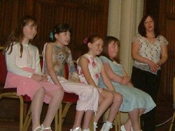 Lydia, Hannah, Eve and Nicola wait to receive their chains