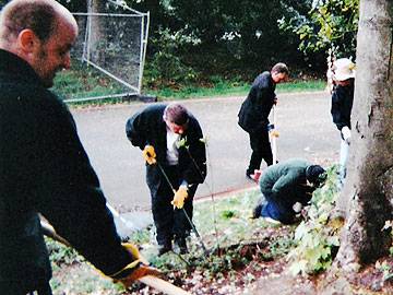 Service users Colin Moorhouse, Lee Radcliffe and Stephen Conway working in Queens Park