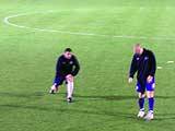 Star midfielders Gary Jones [right] and Jon Doolan warm down after the game