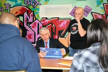 Jack Straw talks with project volunteers