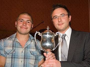 Norden receive the Denis John trophy from Howard Ryder of Carcraft