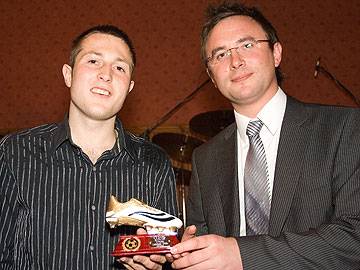 Joint Overall leading goalscorer S Highton (FC Dale) received his trophy from Howard Ryder of Carcraft