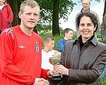 Man of the match, Craig Wood of Wardle receives his trophy from Pauline Journeaux, Rochdale Online