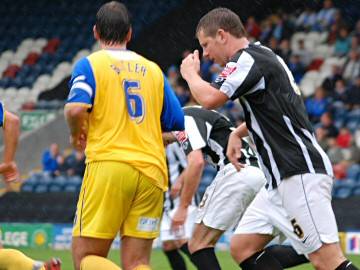 Lee Crooks turns away after directing a free header straight at Danby