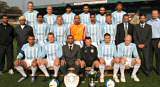 Paul Marr (middle row far right), Director of Rossendale based SponsorBank, with the Roca Juniors team and club officials