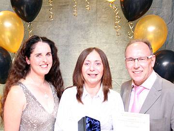 Last year's Rochdale Ambassador, Cathryn Dolinsky of Greggs, with award sponsors Pauline Journeaux & Keith Swift of Rochdale Online