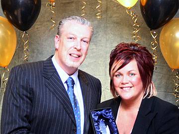 Best National Retailer Award Sponsor in 2007 Lorenzo O'Reilly of Rochdale Exchange Shopping Centre with Debbie O'Brien of Town Centre Management